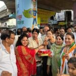 congressmen distribute laddu